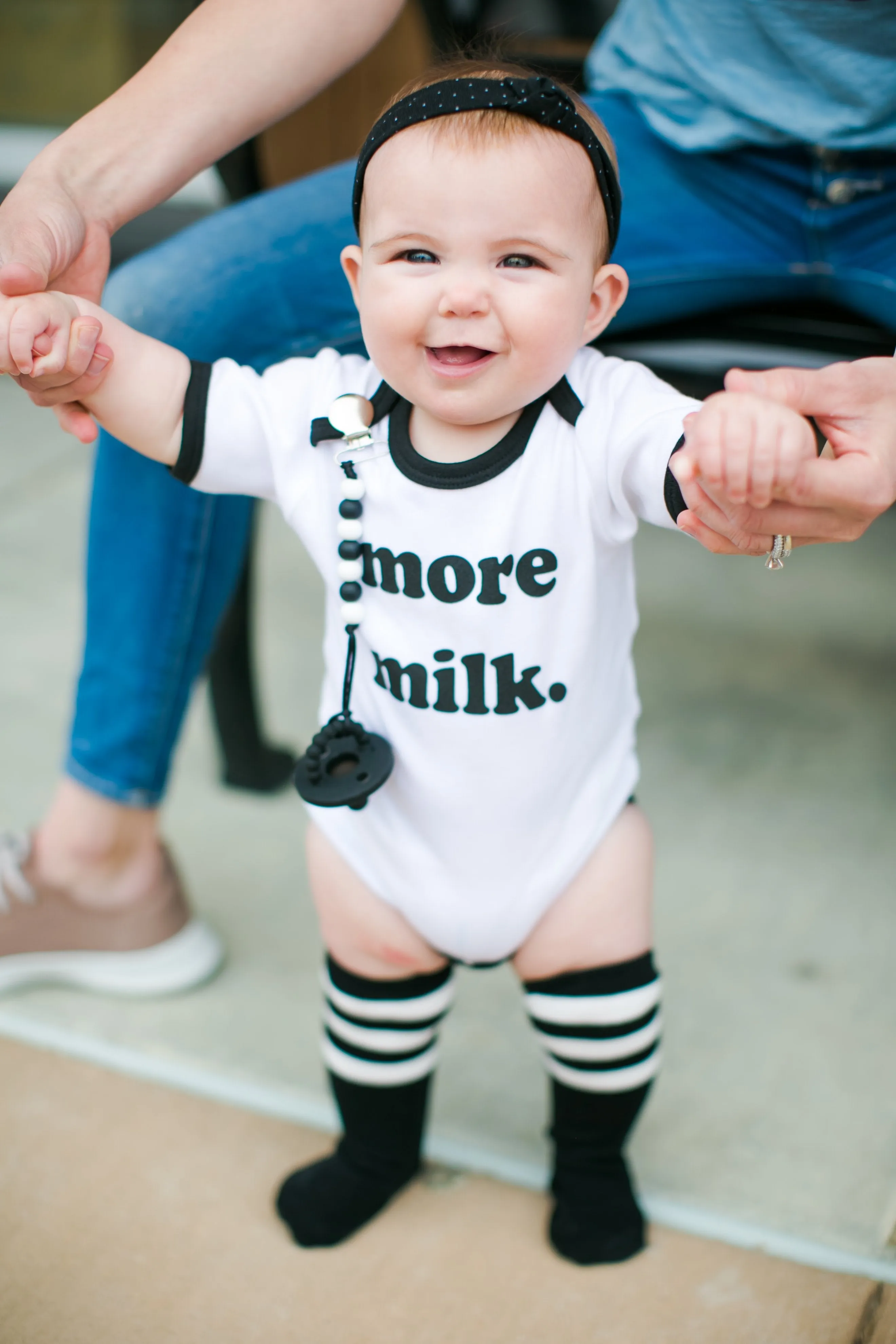 Roman & Leo - More Milk Baby Ringer Onesie in White and Black